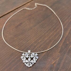 Nolan Miller silver heart rhinestone necklace. Very beautiful. Wear it everyday!